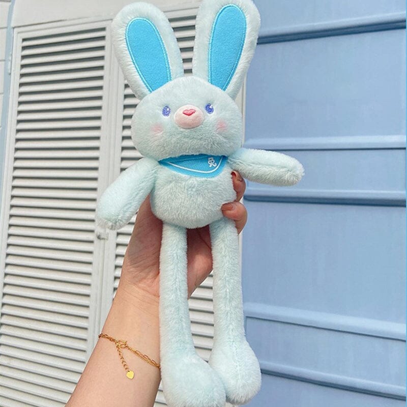 Poupée lapin en peluche