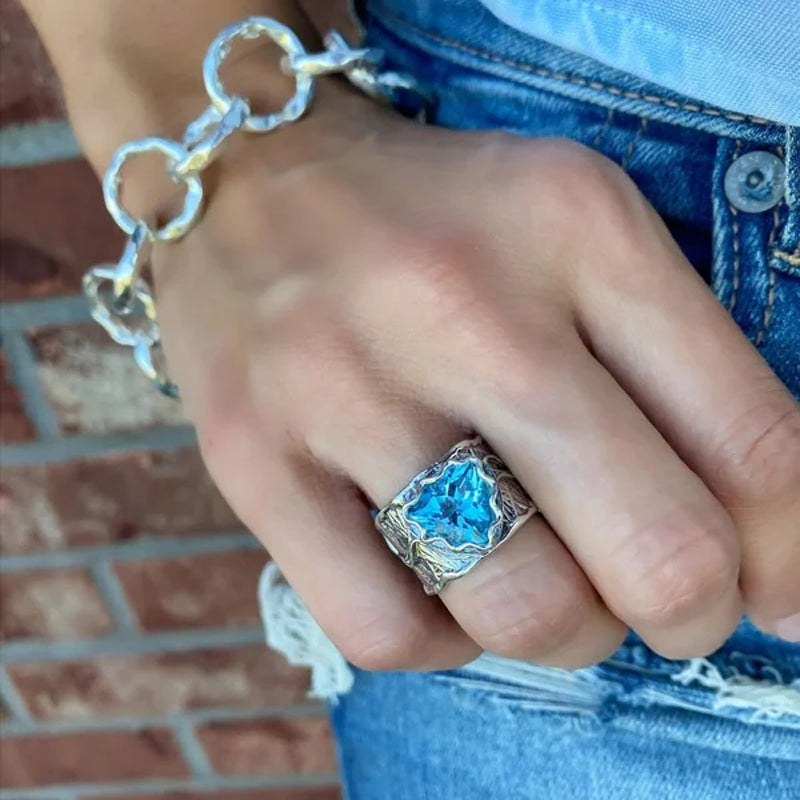 Bague en argent avec topaze bleue