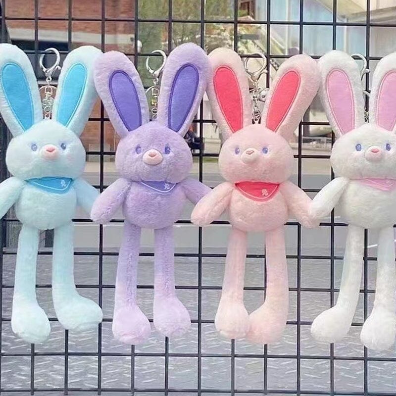 Poupée lapin en peluche