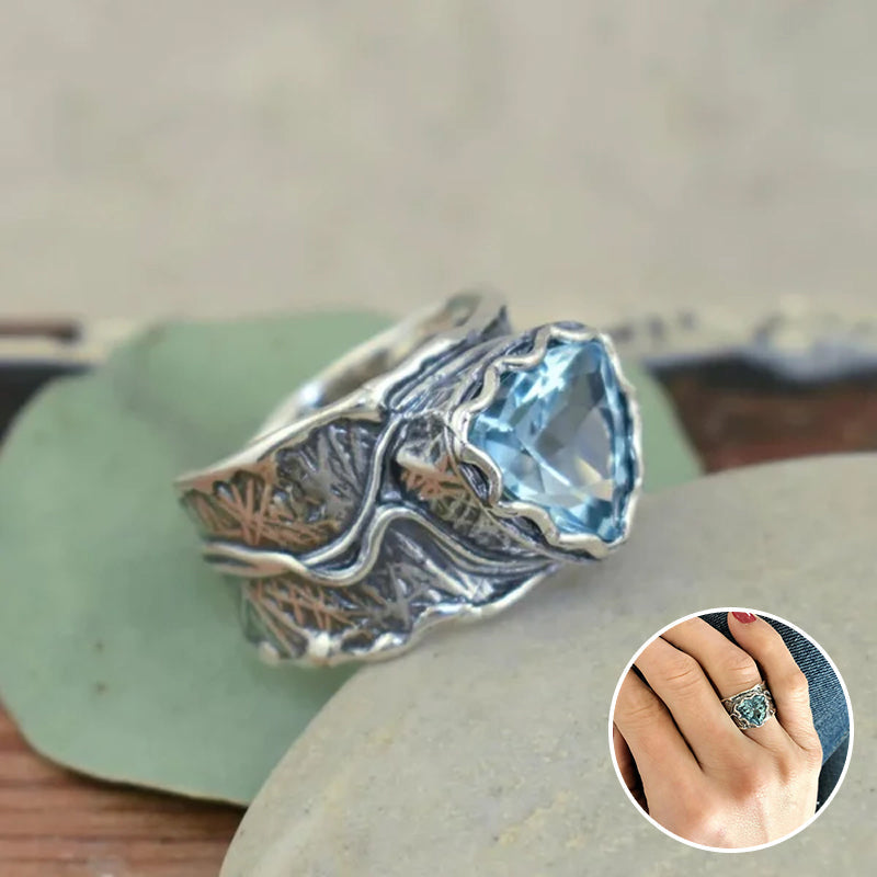 Bague en argent avec topaze bleue