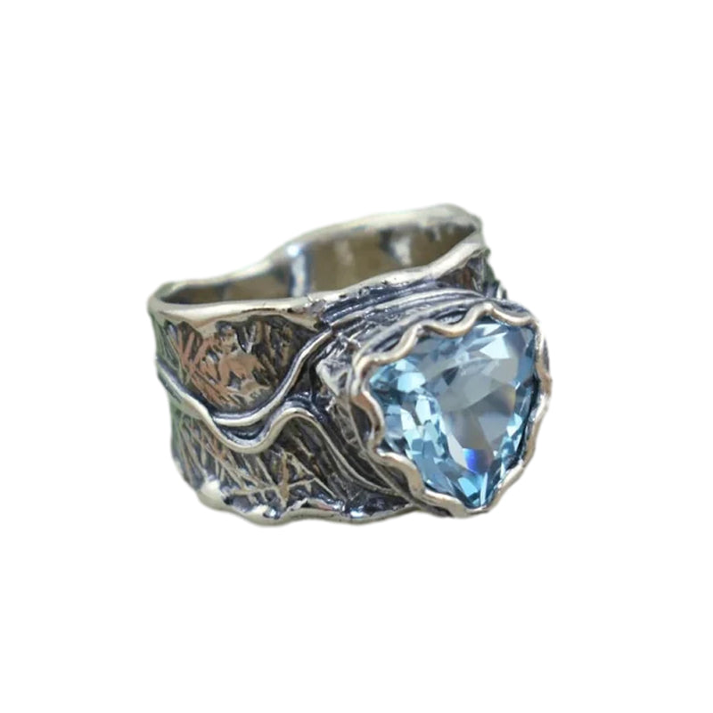 Bague en argent avec topaze bleue